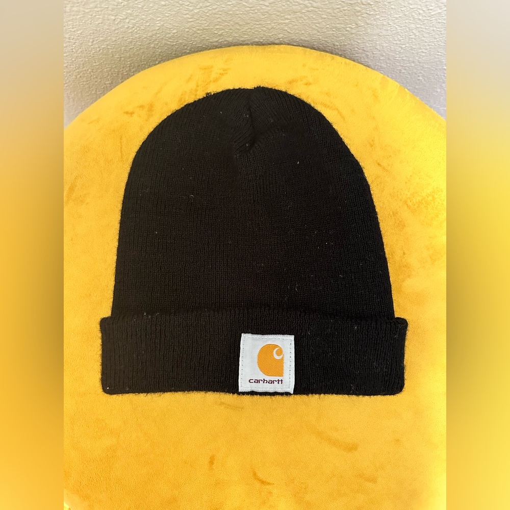 Black Carhartt beanie. One size fits all.